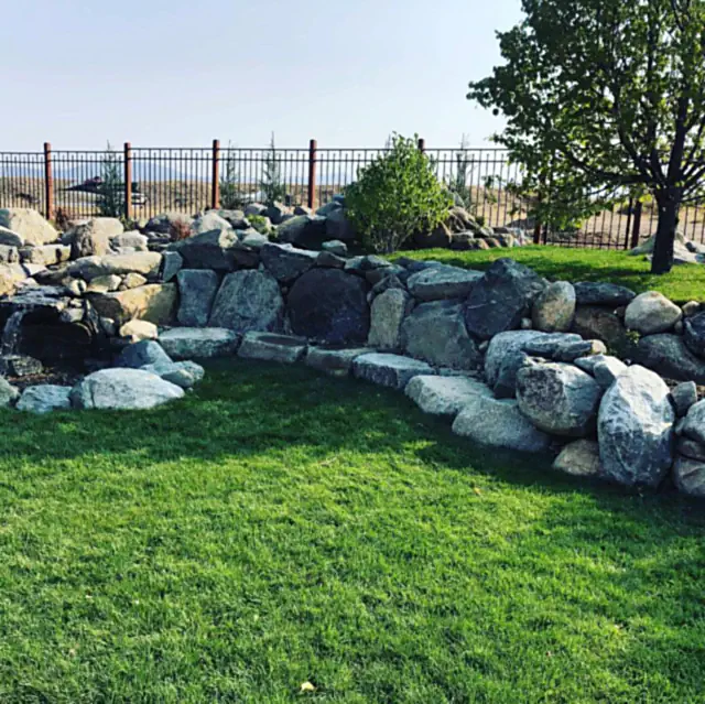 Granite rock wall built into a slope near Genoa