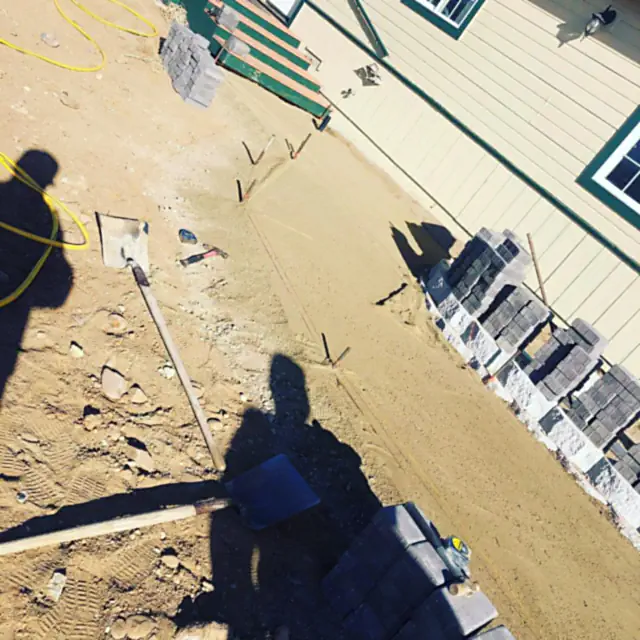 Paver driveway border installation at a Reno property